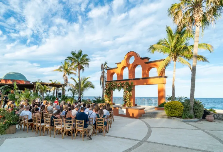 Pool and beachfront resort setting.